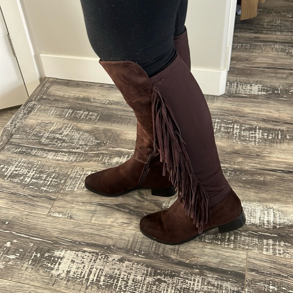EUC fringe boots.